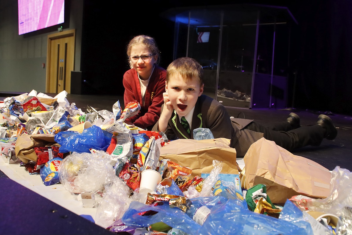 Children from Castle Hill and The Oaks with the pile of waste generated